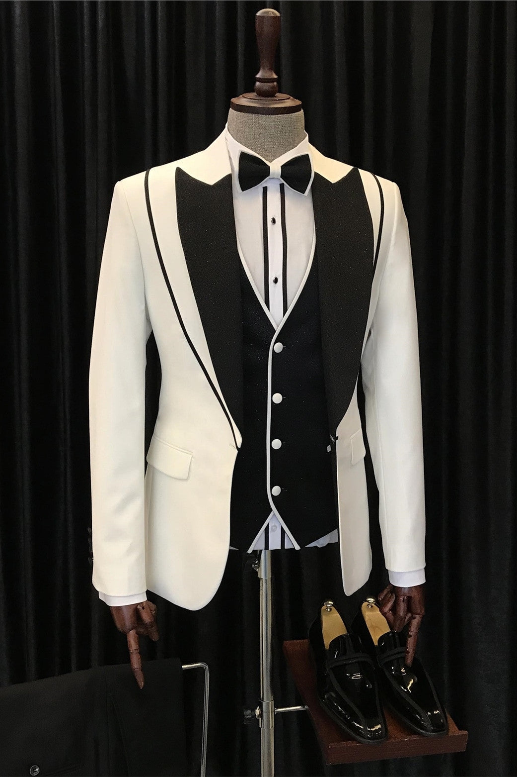 White Peaked Lapel One Button Men Suits With Black Waistcoat Main image